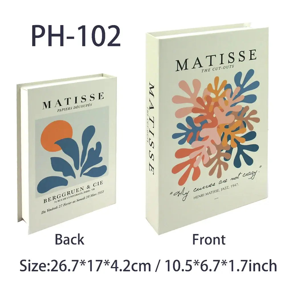 Decorative faux books with Matisse-themed covers, ideal for bohemian chic decor.