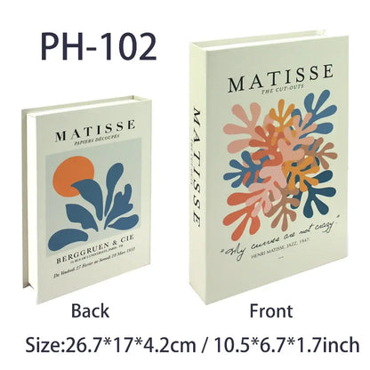 Decorative faux books with Matisse-themed covers, ideal for bohemian chic decor.